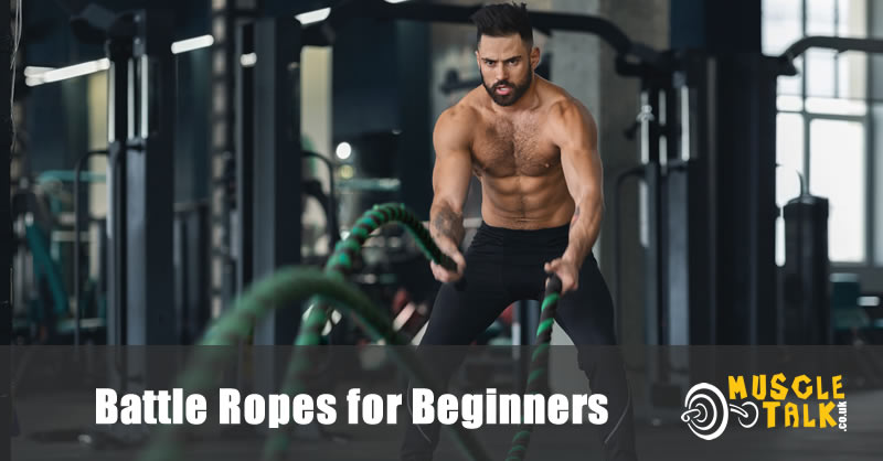 Man exercising with battle ropes