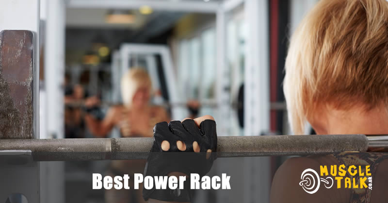 Power rack being used by female in the gym