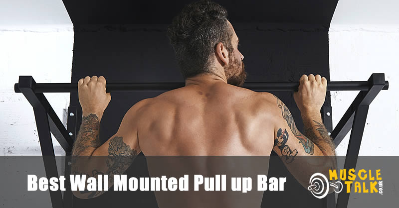 man doing pull-ups on a wall bar