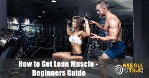 Couple with lean muscle training in the gym