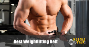 Many putting on a weightlifting belt in the gym