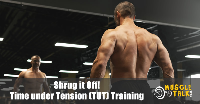 bodybuilder doing shrugs in the gym