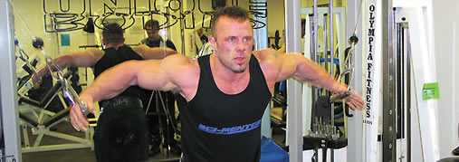 Mike Sheridan IFBB Pro Bodybuilder doing cable crossovers
